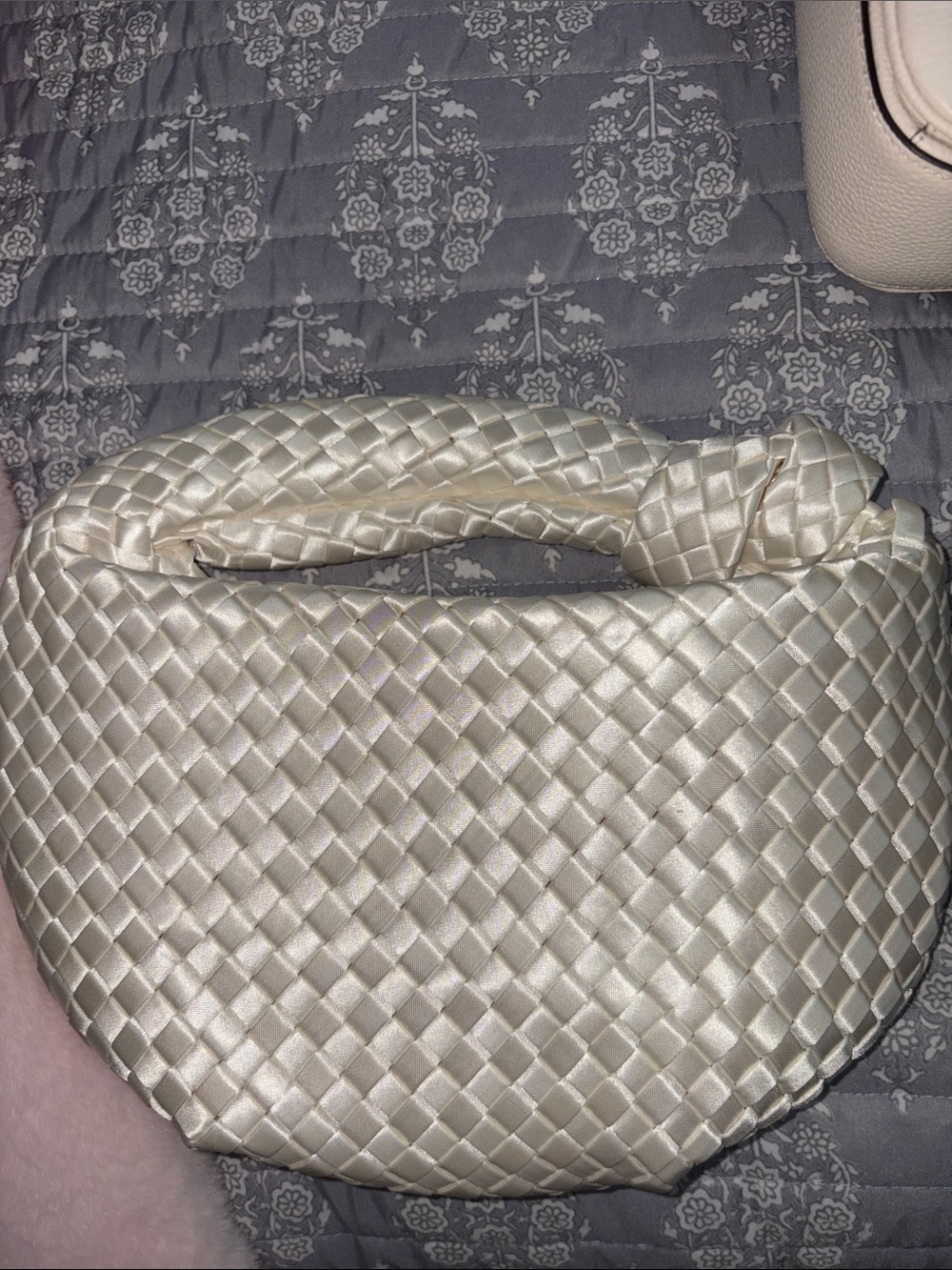 Melie Bianco Woven Satin Knot Handle Bag in Champagne